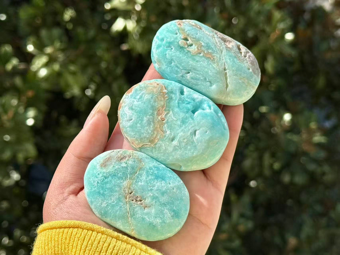 Natural Hemimorphite palm stone.