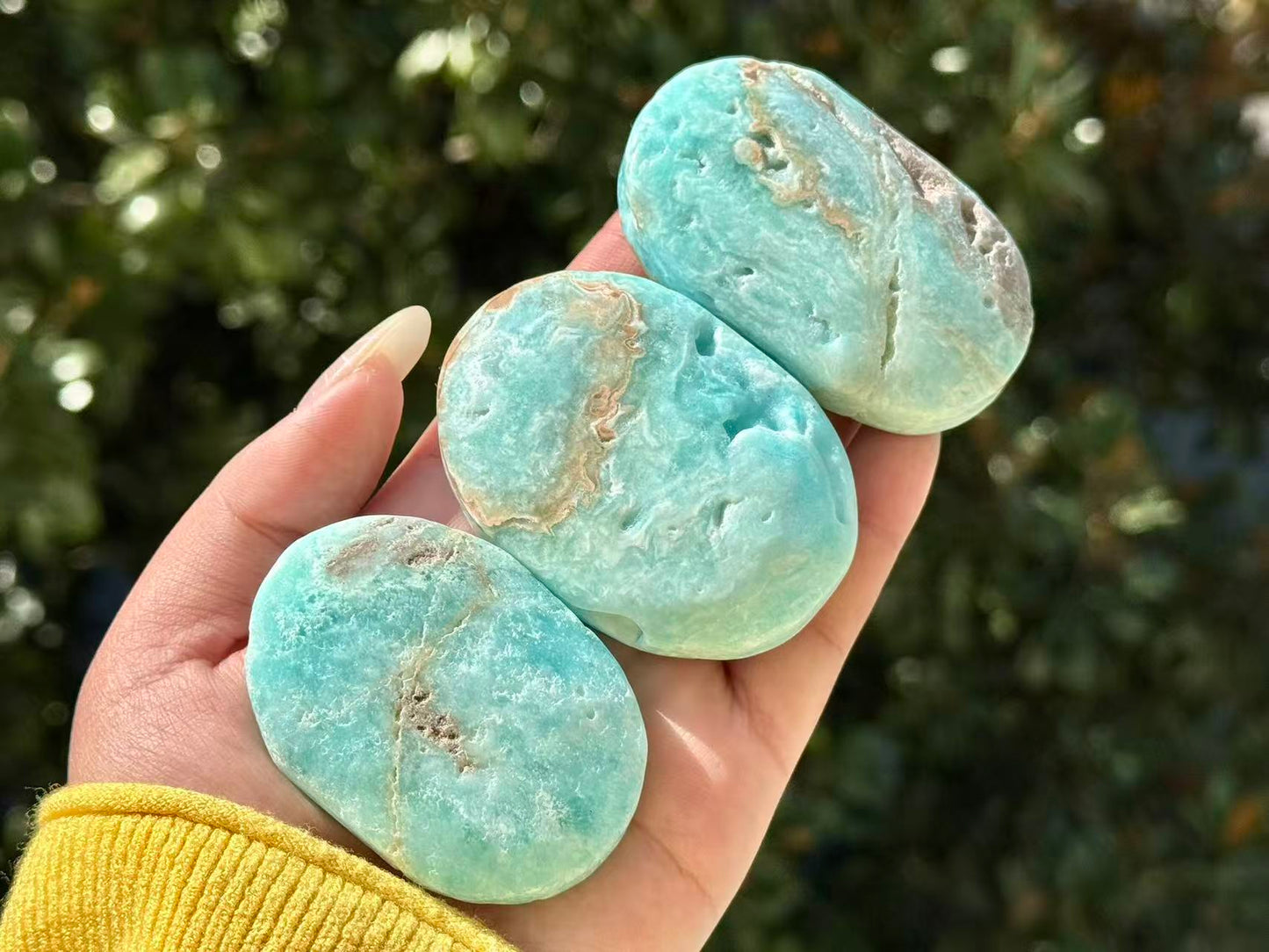 Natural Hemimorphite palm stone.