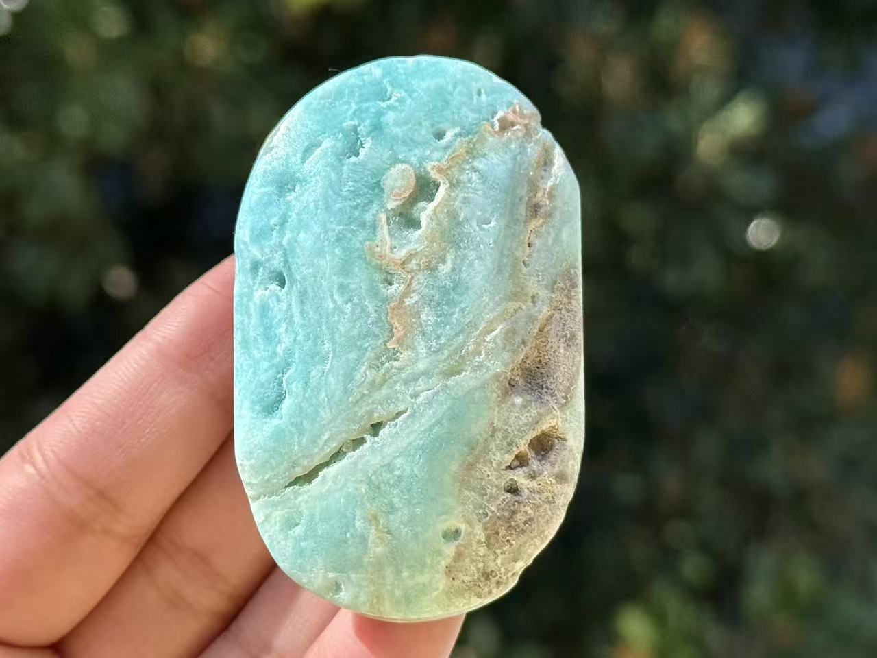 Natural Hemimorphite palm stone.