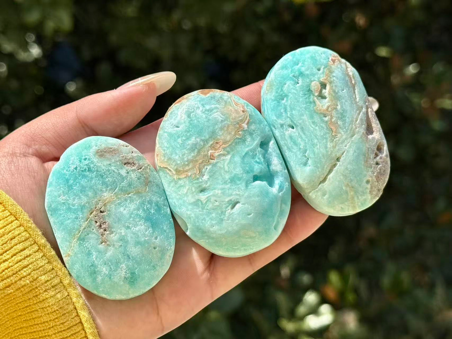 Natural Hemimorphite palm stone.