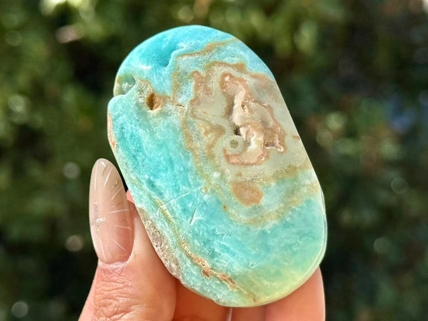 Natural Hemimorphite palm stone.